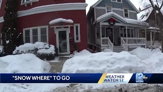 Snow piles up as more is on the way