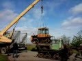 Кран ЗИЛ грузит 2 трактора ДТ-75.