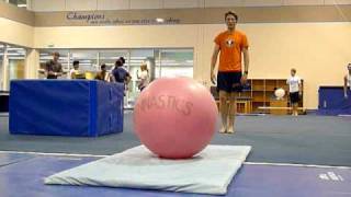 Exercise ball backflip