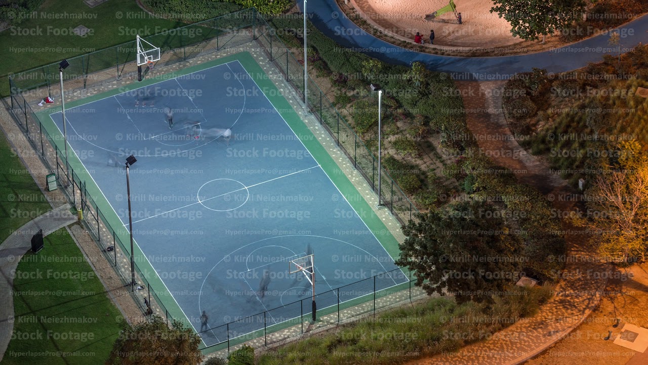 Basketball court at park in Jumeirah Lakes Towers district timelapse, a