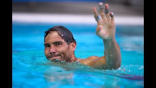Rafael Nadal jumps in a pool after winning the Barcelona Open 2021