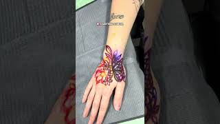 Etfly Hand Tattoo