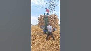 24-volt bale lifter loads bales while walking Car battery driven machine double chain induction