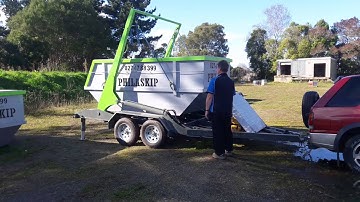 Skip trailer unloading
