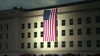 إسدال العلم الأميركي على مقر البنتاغون في الذكرى ال18 لهجمات 11 أيلول/سبتمبر | AFP