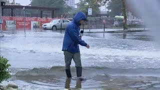 Tidal Floods hit Norfolk leaving streets submerged