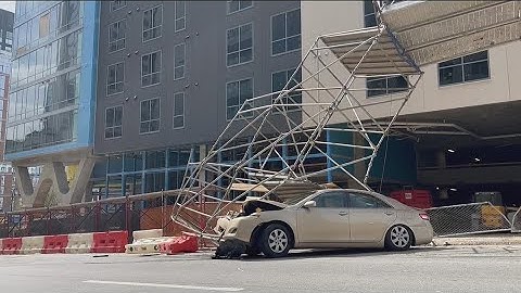 Car crash in Midtown causes scaffolding from construction site to collapse