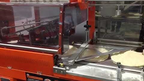 Minipack shrink wrapping system