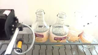 SNEED-JET Inkjet Printer Date Codes on Glass Syrup Bottles