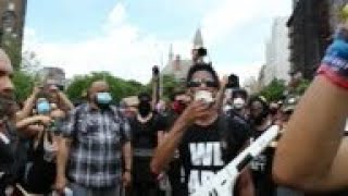 Jon Batiste leads peaceful protest music march