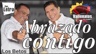 Video thumbnail of "Abrazado Contigo - Los Betos - Con Letra (Video Lyric)"