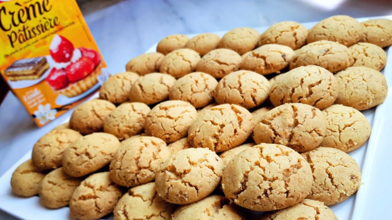 غريبة البهلة ببودرة كريم باتسيير مشققة وناجحة 100% #حلويات العيد