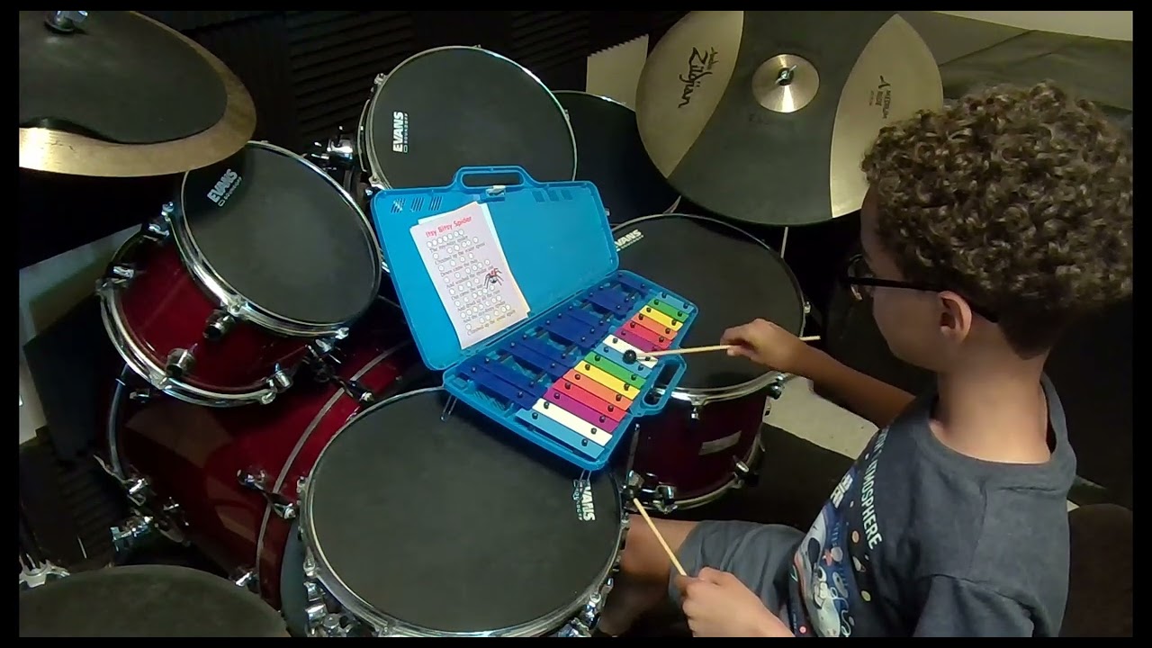 Student 3 plays Itsy Bitsy Spider on the bells