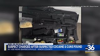 Suspect charged after guns, suspected cocaine found in Knox County