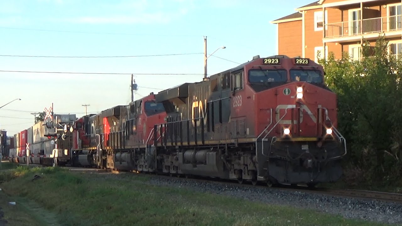 Newly Rebuilt SD75IACC 8340 Trails on a Big Stack Train CN 120 Rolling thru Downtown Moncton, NB