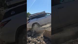 Toyota Fortuner Climbing A Rocky Hill In Kazakhstan