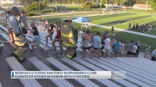 Norfolk citizens and first responders climb flights of stairs in honor of 9/11 victims