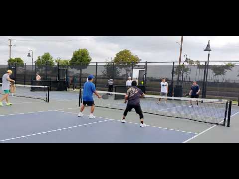 Recreational game ARNOLD PARK : MANNY / TOMMY (near side) vs CHALLENGER 1 & 2 (far side) CYPRESS, CA