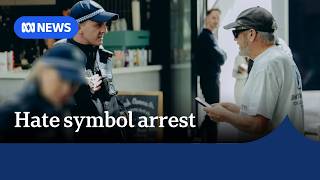 Man arrested after wearing swastika shirt outside antisemitism royal commission | ABC NEWS