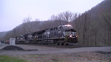 NS 16T with Epic Trash Containers at Dusk