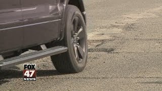 Battle Over Battered Roads at State Capitol