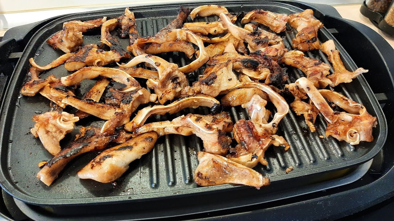 Свиные уши с чесноком и соевым соусом