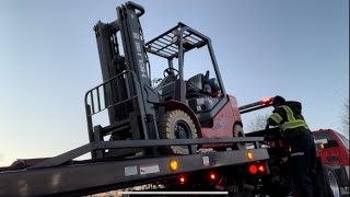 Forklift on my flatbed tow truck