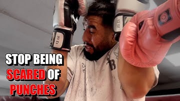 How to STOP Flinching while getting PUNCHED in the Face - Boxing