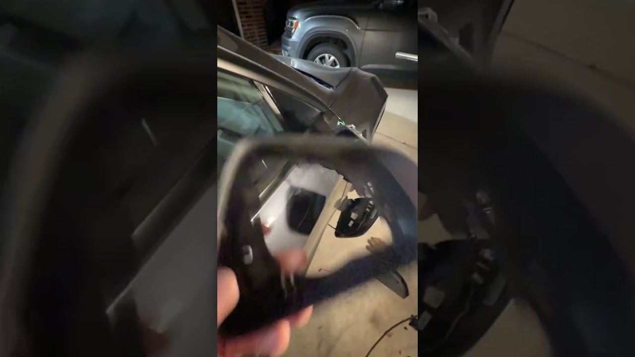 Replace a Tesla Model 3 Highland mirror frame and reassemble.