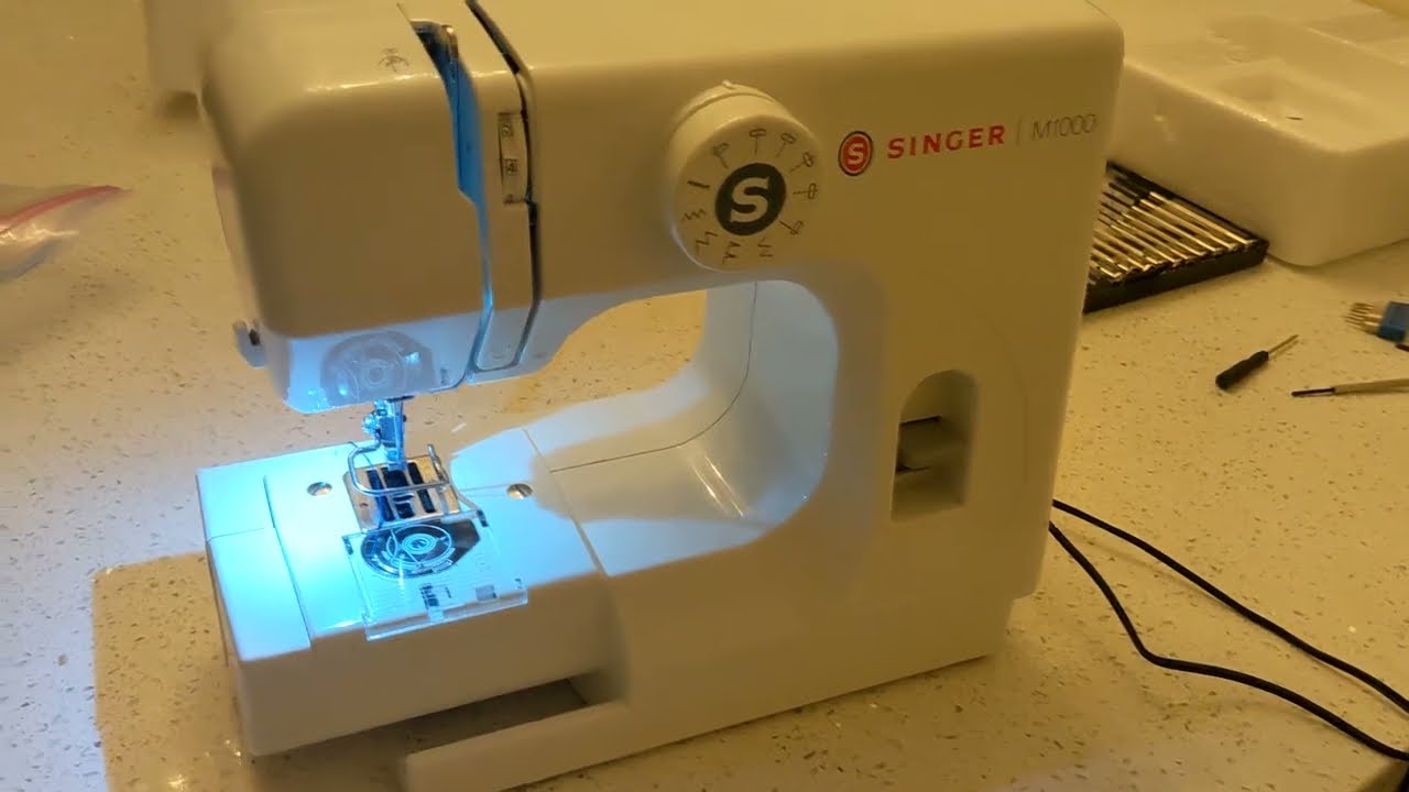 Singer M1000 sewing machine not catching bobbin thread 