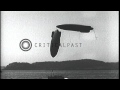 Speedboat tows two blimps at Yokosuka Harbor, Japan. HD Stock Footage