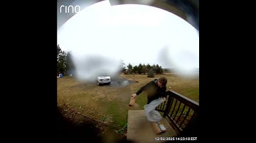 Delivery Driver Protects Competitors Packages From Rain || ViralHog