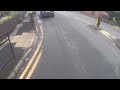 Nissan Juke VE66 VFU Lady oblivious to cyclist on a roundabout HINDLEY WIGAN