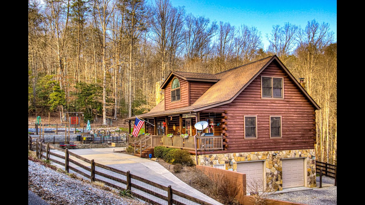 Log cabin for sale in gated riverfront community at 3859 Bear Track Way, Del Rio