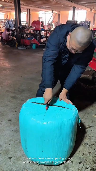 Hay bale being unwrapped