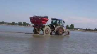 Rice Seeding 2014 - New Holland TD5050 Iron Wheels + Kuhn Axis 30.1 W