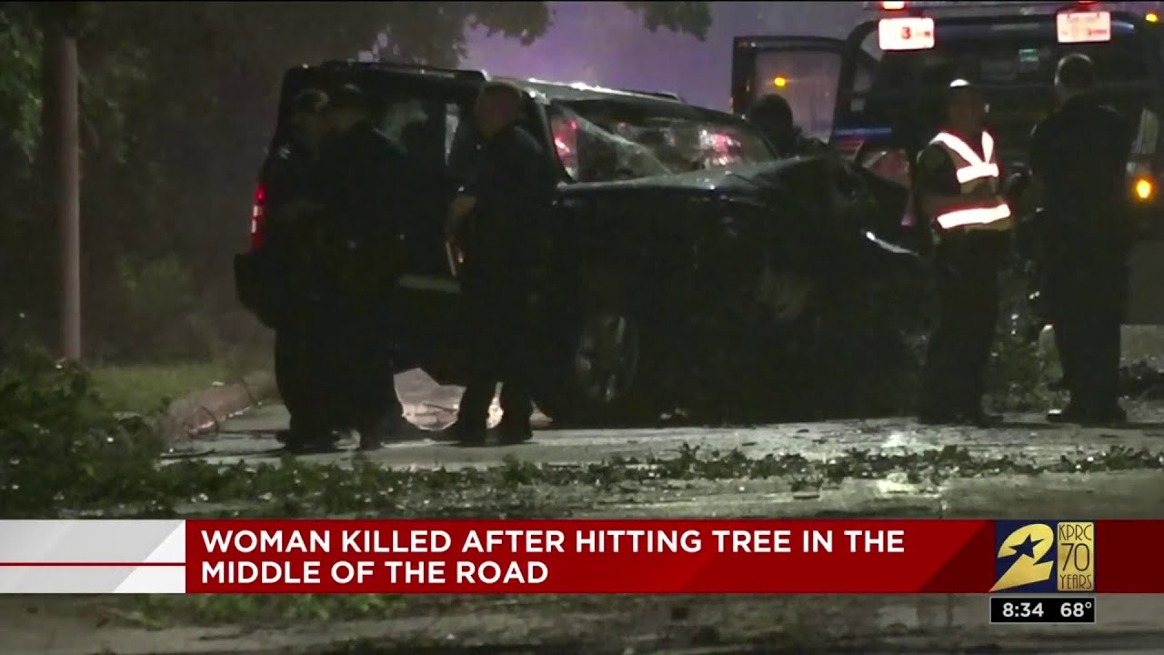 Woman killed after hitting tree in middle of the road - YouTube