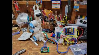 Robotic Arm Controlled by a Virtual Particle Swarm