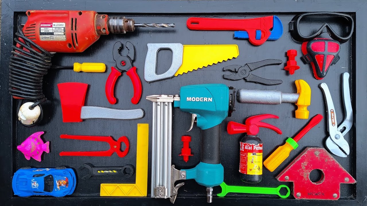 Collection of Repair Tools, Electric Drill, Electric Saw, Hammer With Wriench, Pliers, Hacksaw