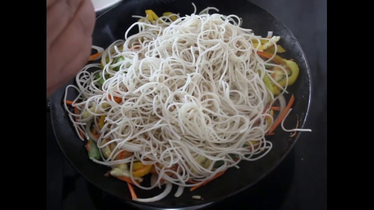 chilli garlic noodle topped with shredded beef. YouTube