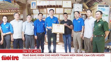 Trao bằng khen cho người thanh niên dũng cảm cứu người trong nước lũ