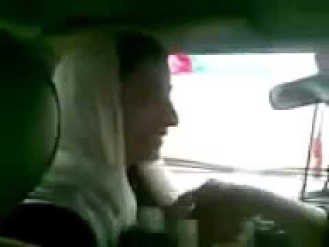 Afghani girl kissing in car
