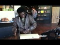 Charles Bradley experiencing the theremin in The Moog Store.
