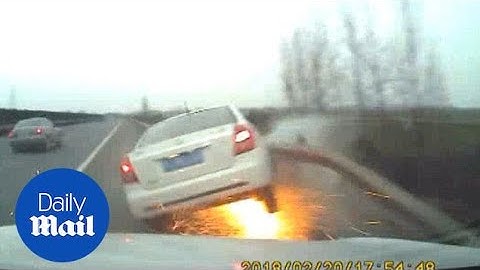 The dramatic moment overtaking car causes motorway collision - Daily Mail