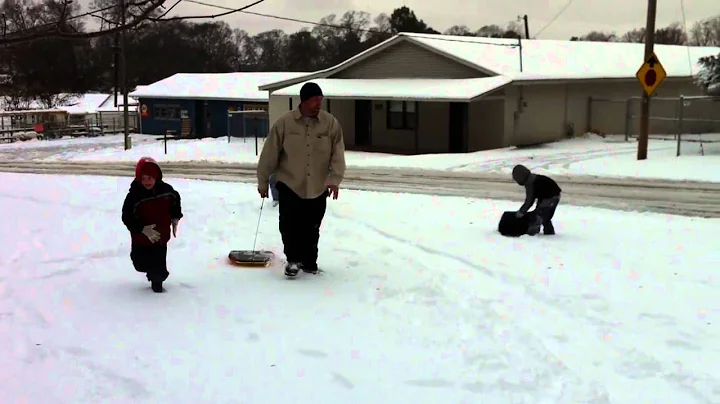 Sledding In The Snow
