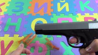 Игрушечный пистолет. Пистолет, стреляющий присосками
