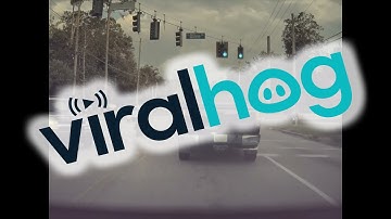 Motorcycle Rips Bumper Bar Clean off Car in Extremely Close Call || ViralHog