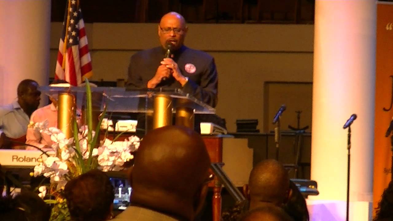 Bishop Paul. S Morton sings " Lord whatever you're doing in this season