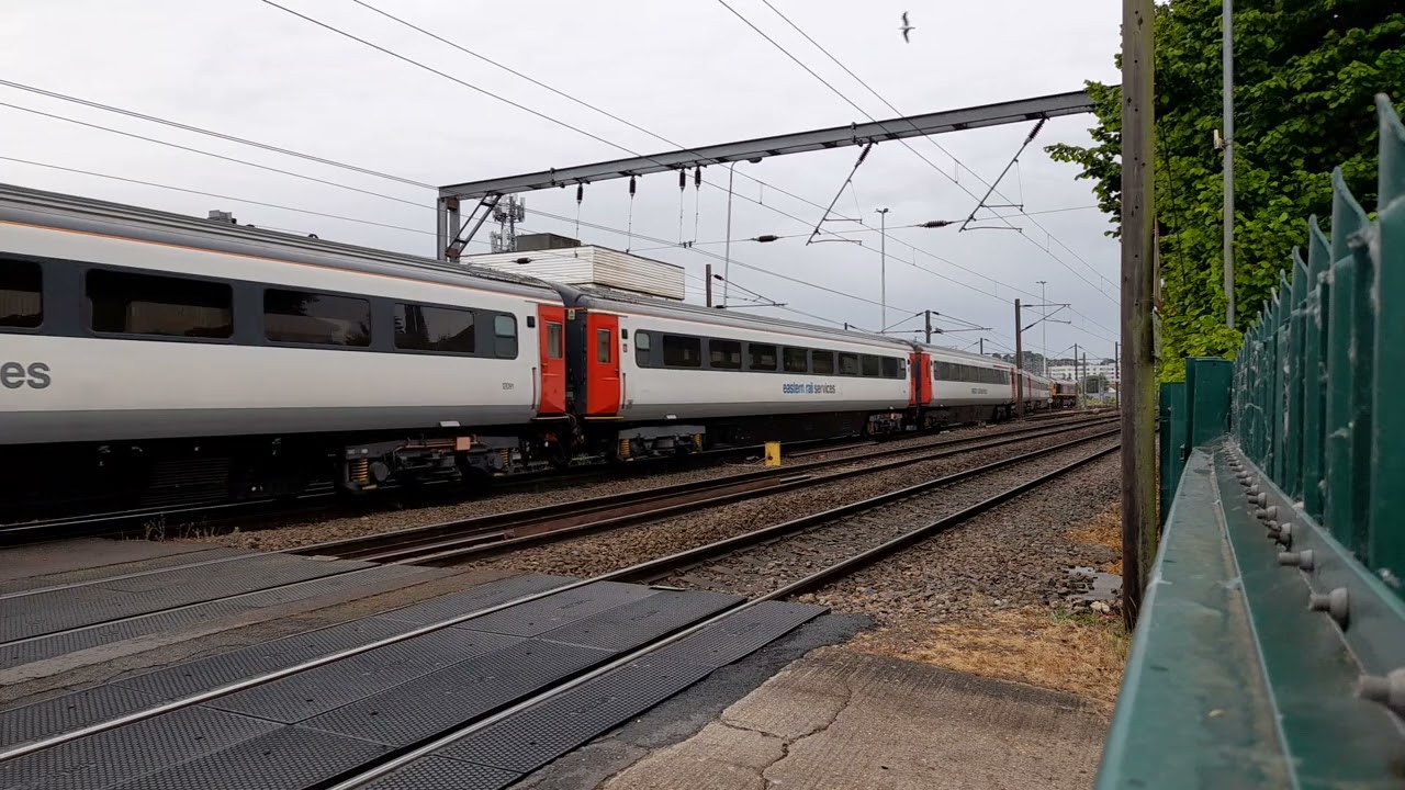 GBRf 57310 leads with a rake of ERS coaches with 66765 on the rear pass cremorne lane on 22/5/25