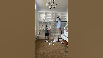 DIY IKEA library wall with a ladder for $2,165—looks totally custom! #ikeahack #diylibrary